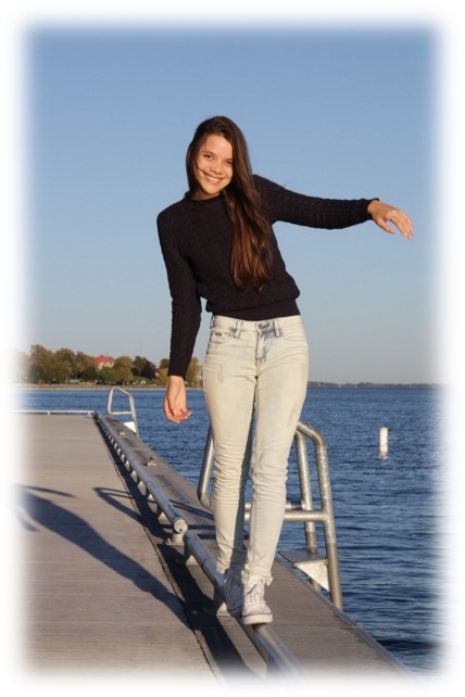 "Maria standing on the pier at Breakwater Park"