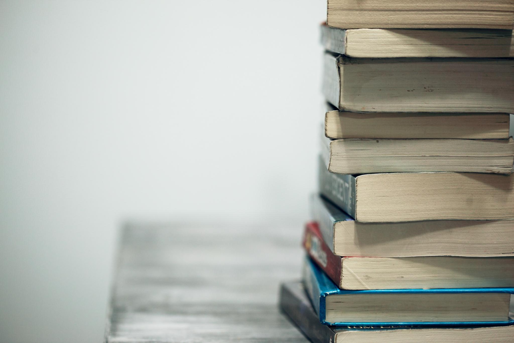 a stack of books on a table