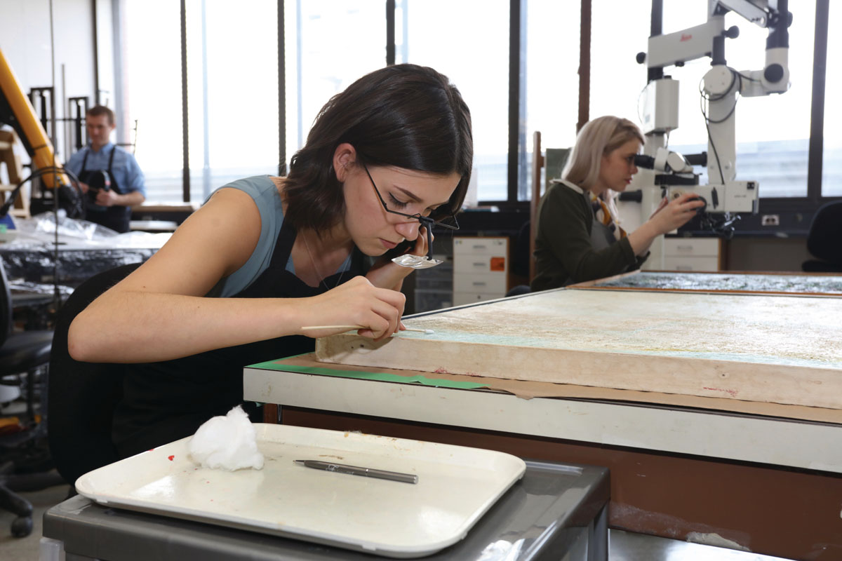 Girl focusing on project in lab